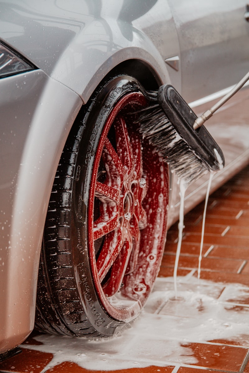 Professional car wash — wheel cleaning