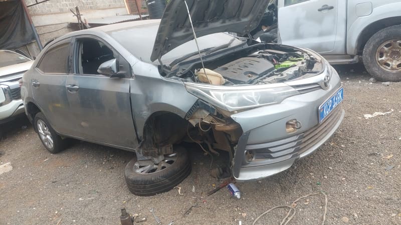 Toyota Corolla KCP 139K before repair, front-end crash damage